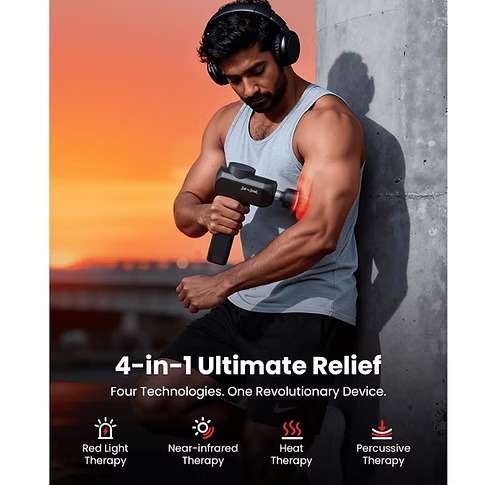 A man wearing over-ear headphones massages his upper arm with a black X6 Ultra handheld massage gun. The background shows an orange sunset and a concrete wall, with text overlays reading '4-in-1 Ultimate Relief, four technologies. One revolutionary device.' and feature icons for Red Light Therapy, Near-Infrared Therapy, Heat Therapy, and Percussive Therapy.