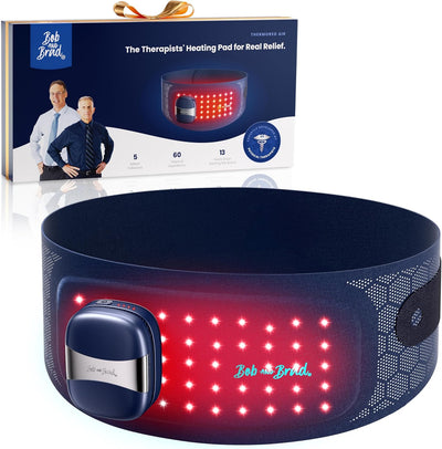 A Bob on Brad heated LED pad for around the waist, with its retail box in the background. The product is dark navy blue with a grid of glowing red LEDs and a matching dark blue control module.