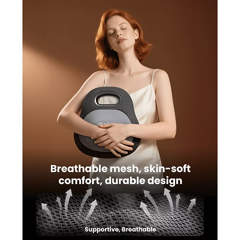 A woman in a cream satin slip dress holds a black and gray portable back massager against her stomach. The image features a brown gradient background with white text overlays reading 'Breathable mesh, skin-soft comfort, durable design' and 'Supportive, Breathable' with arrows pointing upwards through a mesh texture at the bottom.