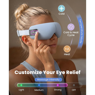 Woman wearing a smart eye massager with temperature control options and massage intensity settings. Cold, cold & heat cycle, and heat. Massage intensity: light, medium, strong, off. 