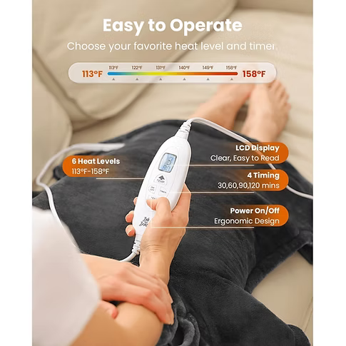 A women sitting with her legs out in front of her with a heating pad over her lap and legs holding the controls. Text includes: Easy to operate, choose your favorite heat level and timer 113°F to 158°F. 6 heat levels, LCD display (clear, easy to read), 4 timing ( 30,60,90,120 mins), power on/off (ergonomic design). 