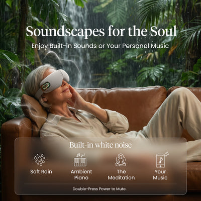 Woman using a gray eye massager in a relaxing setting with text about soundscapes for the soul. Text includes: Enjoy built-in sounds or your personal music. Built-in white noise: soft rain, ambient piano, the Meditation, your music; double-press power to mute. 