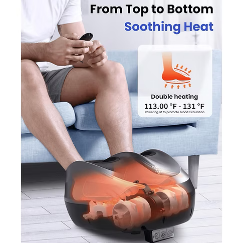 A man sits on a light blue sofa using a foot massage machine placed on a wooden floor. The machine is transparent and shows internal massage rollers with glowing orange heat effects. Text includes: From top to bottom, soothing heat. Double heating: 113°F - 131°F .