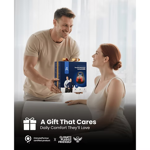 A man leaning over a couch and presenting a women, who is sitting on the couch, with the Bob and Brad EZBack Go back massager in a blue box. Text Includes: A gift that cares. Daily comfort they'll love. 